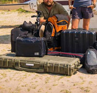 explorer cases lying in the dirt to show how dustproof they are