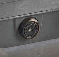 a close up of a black Peli 1470 laptop cases automatic pressure equalisation valve