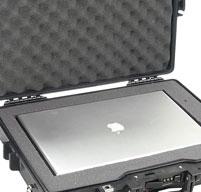 a close up of a Apple Mac laptop inside a peli 1495 laptop case