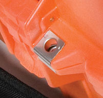 close up of an orange peli 1460ems case showing the padlock protectors and stainless steel hardware
